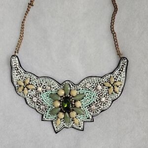 Elegant Beaded Necklace with Green and Cream Accents